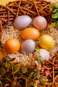 Colourful Easter eggs in basket